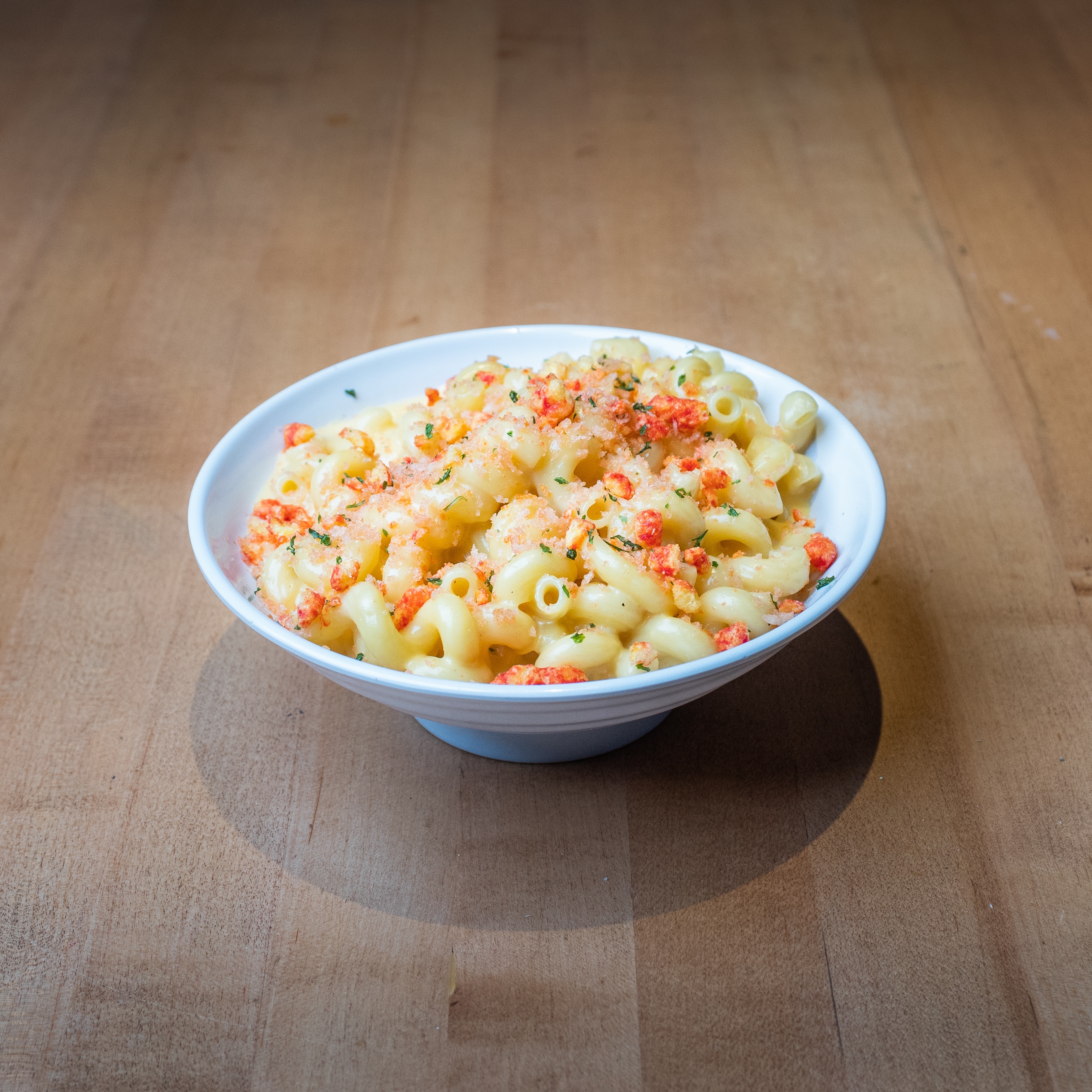 Mac & Cheese Side - Our signature mac & cheese, buffalo sauce & sliced...